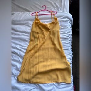 yellow, slightly see-through dress